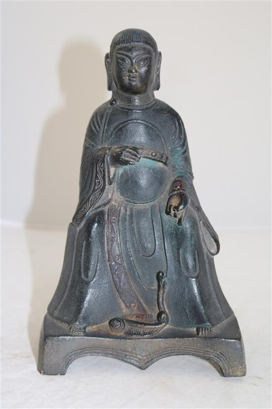 A Chinese bronze figure of Hsuan Tien Shang Ti, Ming dynasty or later, 24.5cm